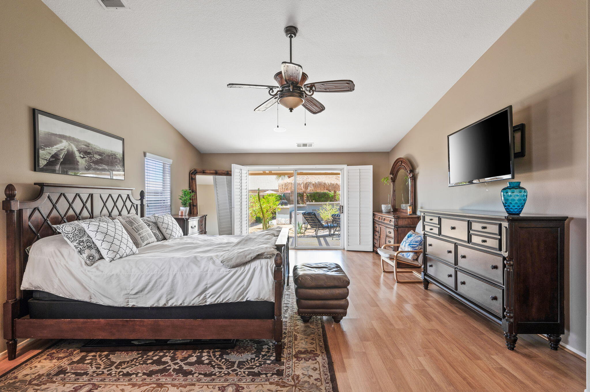 83414 Greenbrier Drive Indio, CA 92203 - Photo 29 of 43 a bedroom with a bed and a flat screen tv