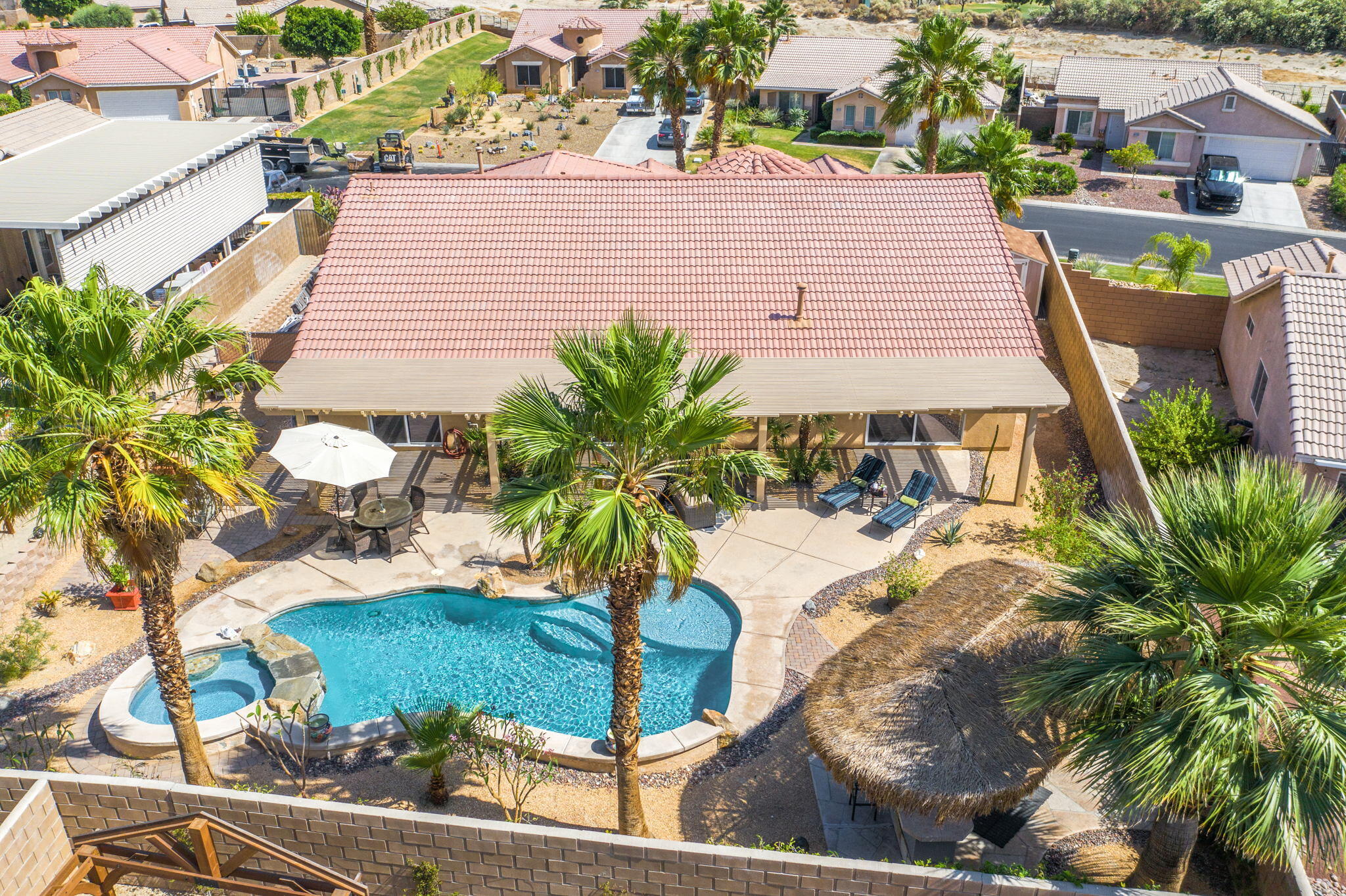 83414 Greenbrier Drive Indio, CA 92203 - Photo 7 of 43 an aerial view of a house with a yard and lake view