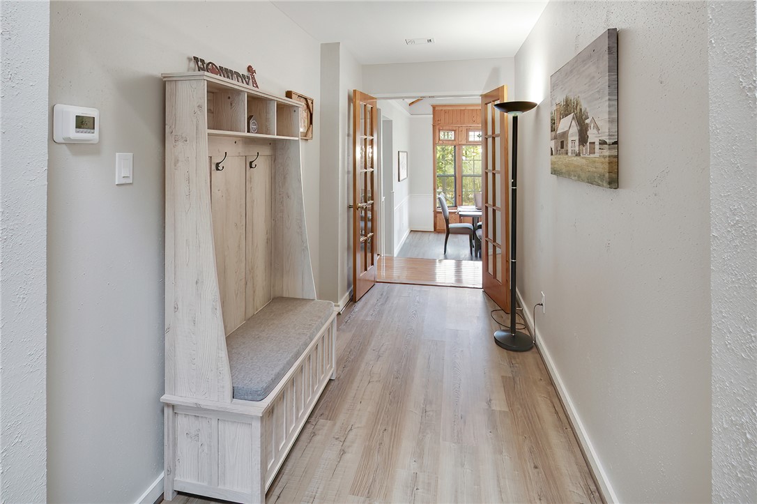 8010 Perry Lane College Station, TX 77845 - Photo 23 of 47 a view of a hallway with wooden floor and staircase