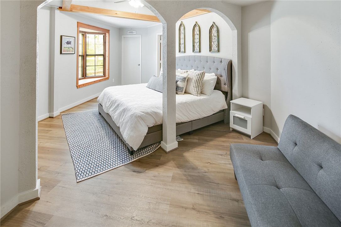 8010 Perry Lane College Station, TX 77845 - Photo 24 of 47 a bedroom with a large bed and a window