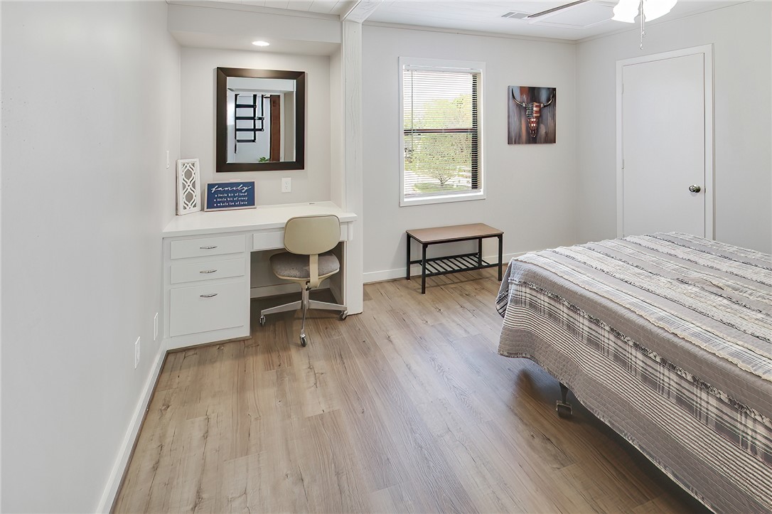 8010 Perry Lane College Station, TX 77845 - Photo 39 of 47 a bed room with a bed and a table