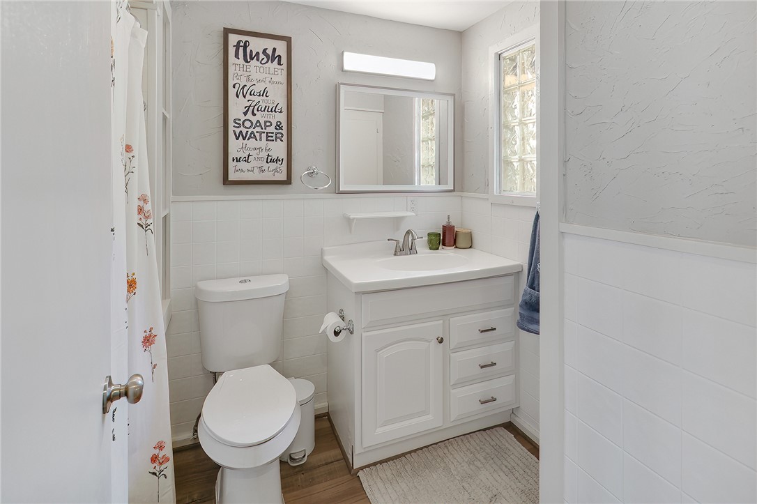 8010 Perry Lane College Station, TX 77845 - Photo 40 of 47 a bathroom with a toilet sink and mirror