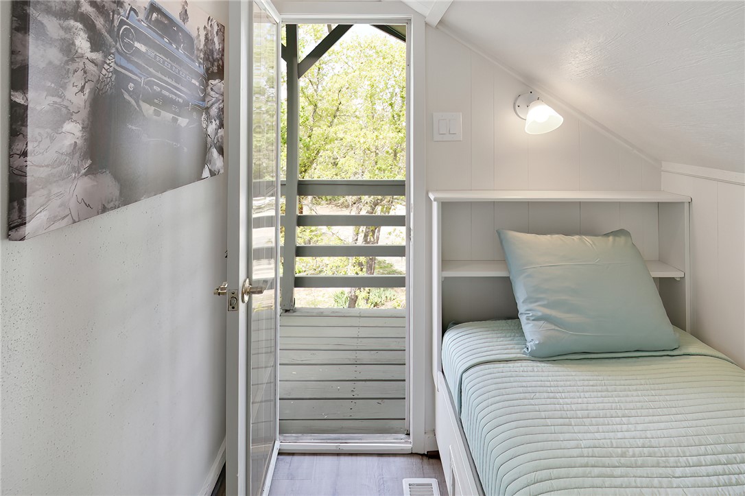 8010 Perry Lane College Station, TX 77845 - Photo 44 of 47 a bedroom with a bed and a window