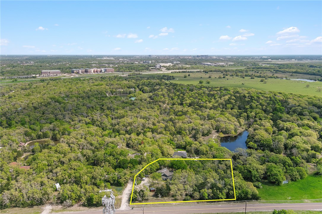 8010 Perry Lane College Station, TX 77845 - Photo 47 of 47 an aerial view of residential houses with outdoor space and trees