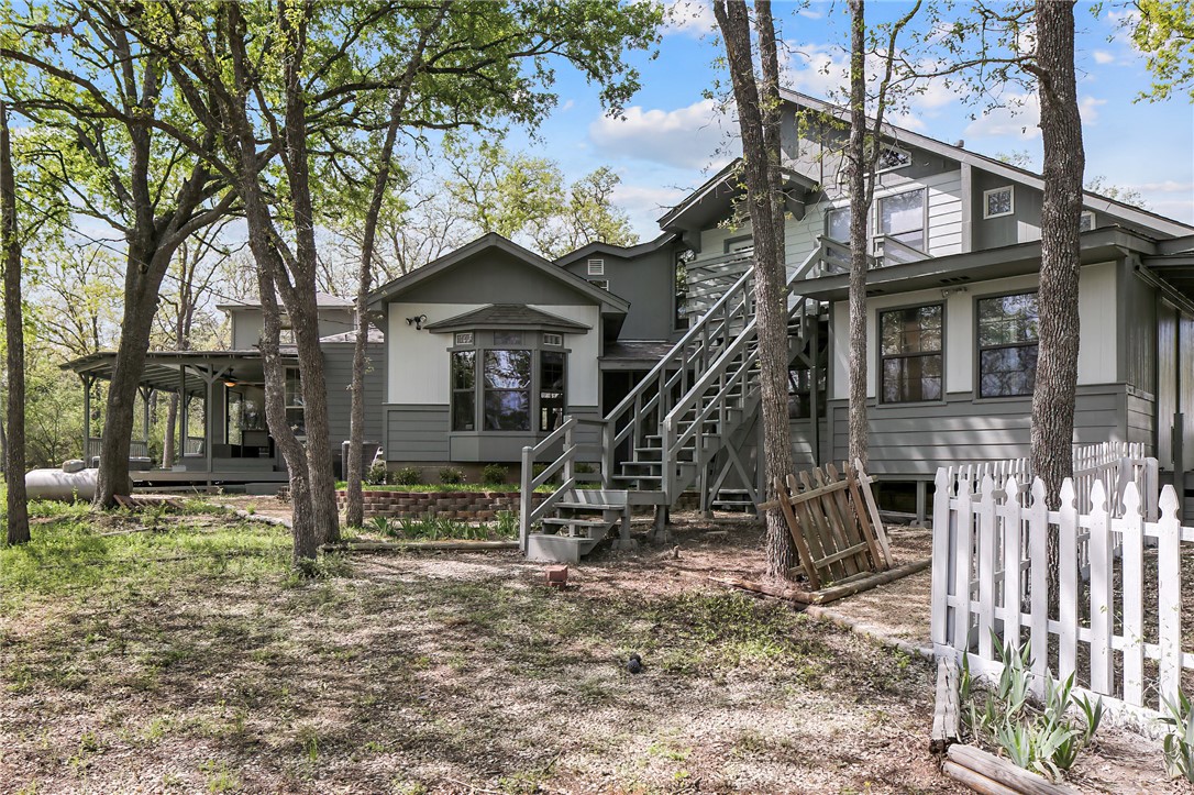 8010 Perry Lane College Station, TX 77845 - Photo 8 of 47 a view of a house with a yard