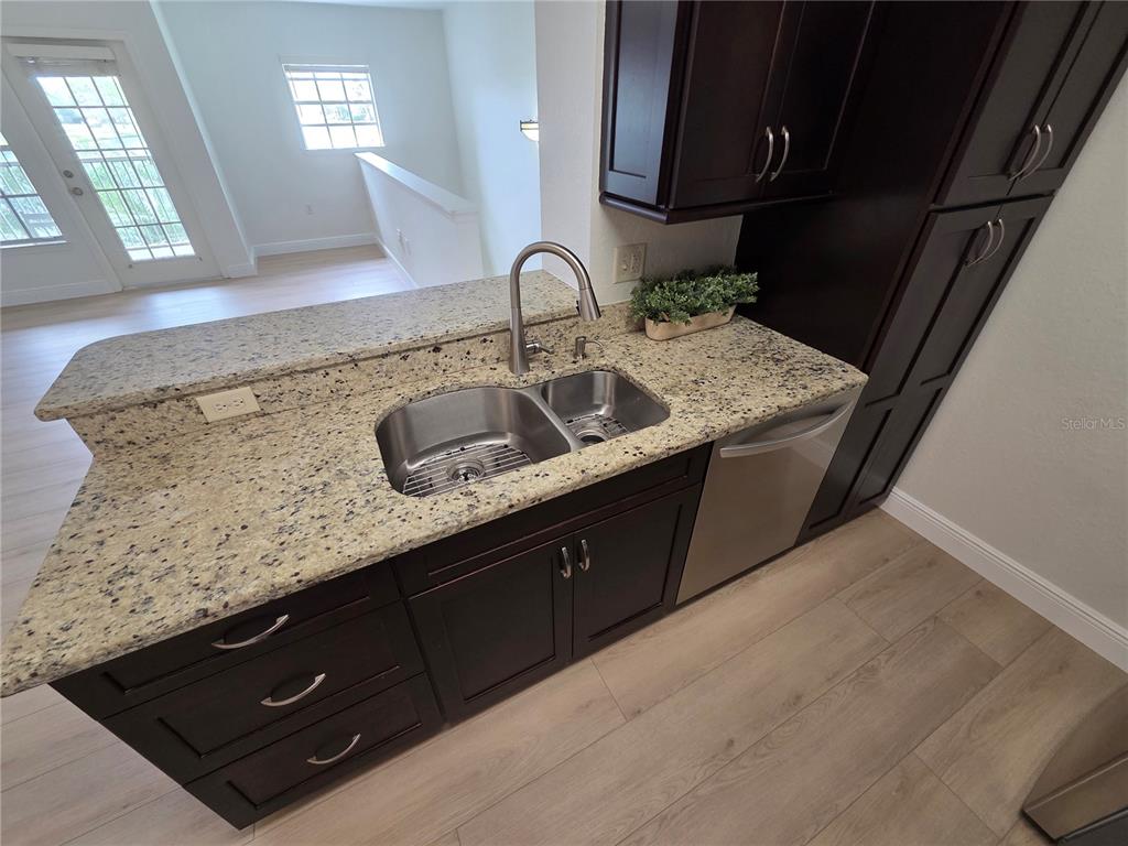 8905 Manor Loop, Unit 205 Lakewood Ranch, FL 34202 - Photo 11 of 30 a close view of sink and mirror