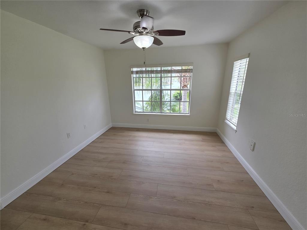 8905 Manor Loop, Unit 205 Lakewood Ranch, FL 34202 - Photo 20 of 30 a view of an empty room with a window