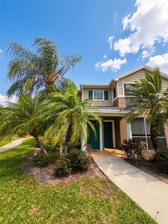 8905 Manor Loop, Unit 205 Lakewood Ranch, FL 34202 - Photo 2 of 30 a view of a house with a patio