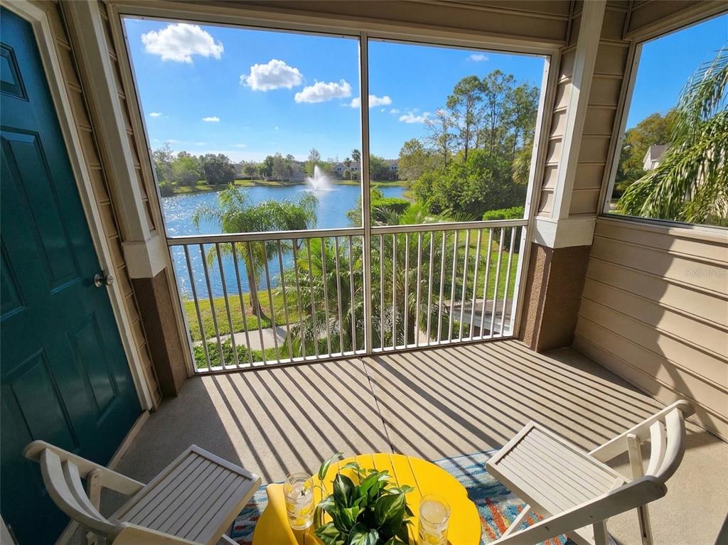 8905 Manor Loop, Unit 205 Lakewood Ranch, FL 34202 - Photo 27 of 30 a view of balcony with wooden floor
