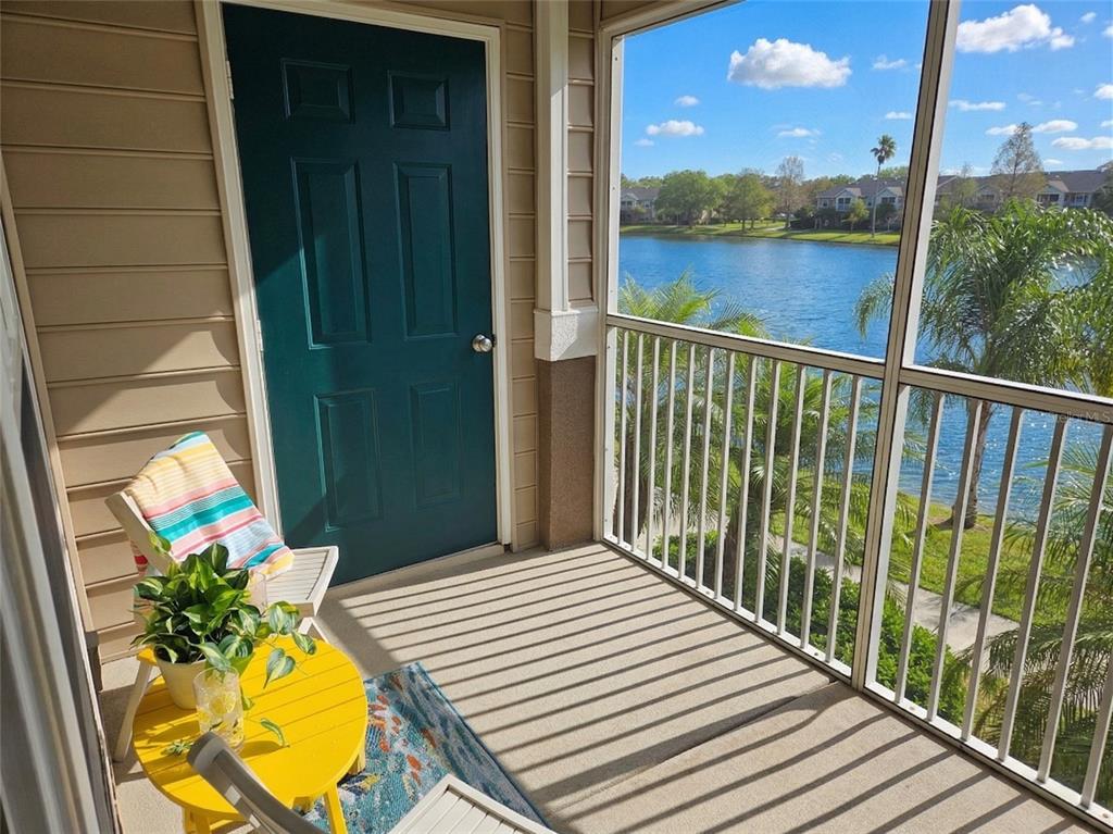 8905 Manor Loop, Unit 205 Lakewood Ranch, FL 34202 - Photo 28 of 30 a balcony with view of lake view