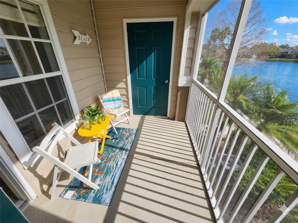 8905 Manor Loop, Unit 205 Lakewood Ranch, FL 34202 - Photo 29 of 30 a view of deck and chair