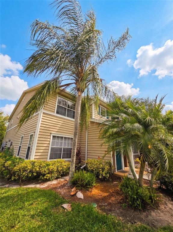 8905 Manor Loop, Unit 205 Lakewood Ranch, FL 34202 - Photo 3 of 30 a front view of a house