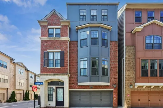 a front view of a multi story residential apartment building