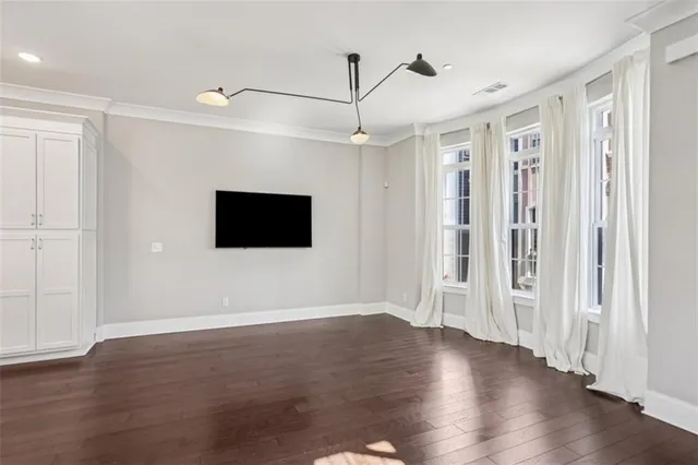 a view of a livingroom with wooden floor