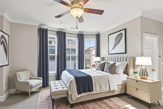 a bedroom with double bed and a chandelier