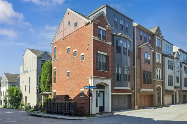 a view of a large building with a door and wooden floor