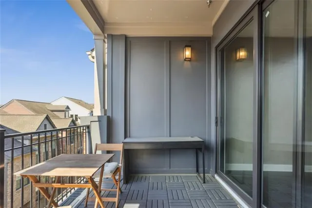 a view of a hallway with entryway door