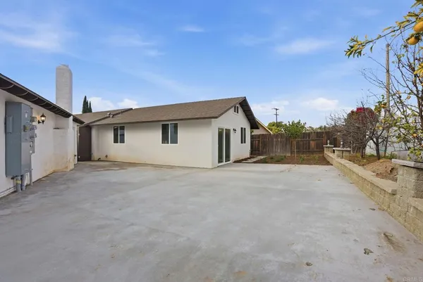 a view of garage and yard