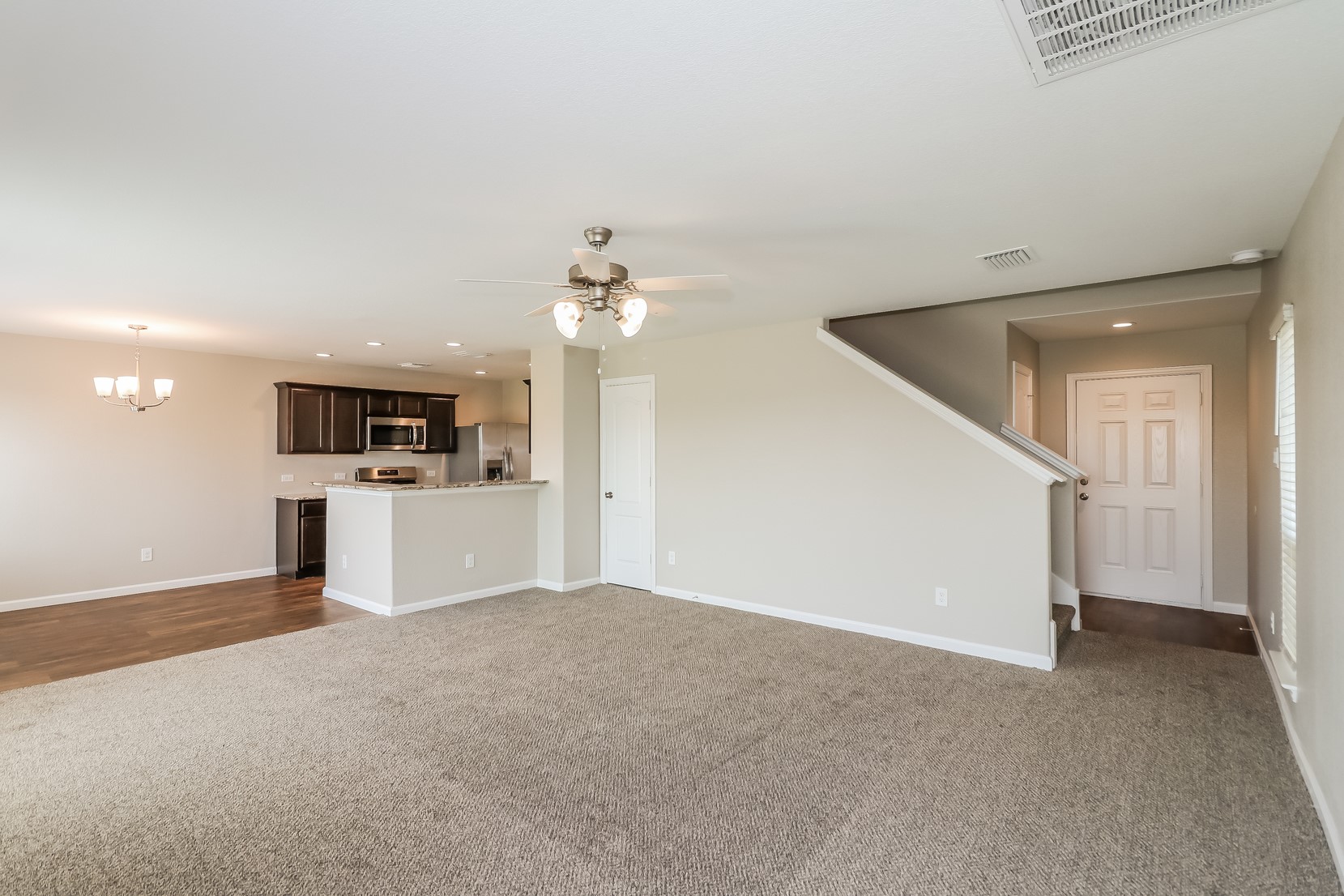 2706 Old Draw Drive Humble, TX 77396 - Photo 6 of 15 a view of a kitchen with a sink and a refrigerator