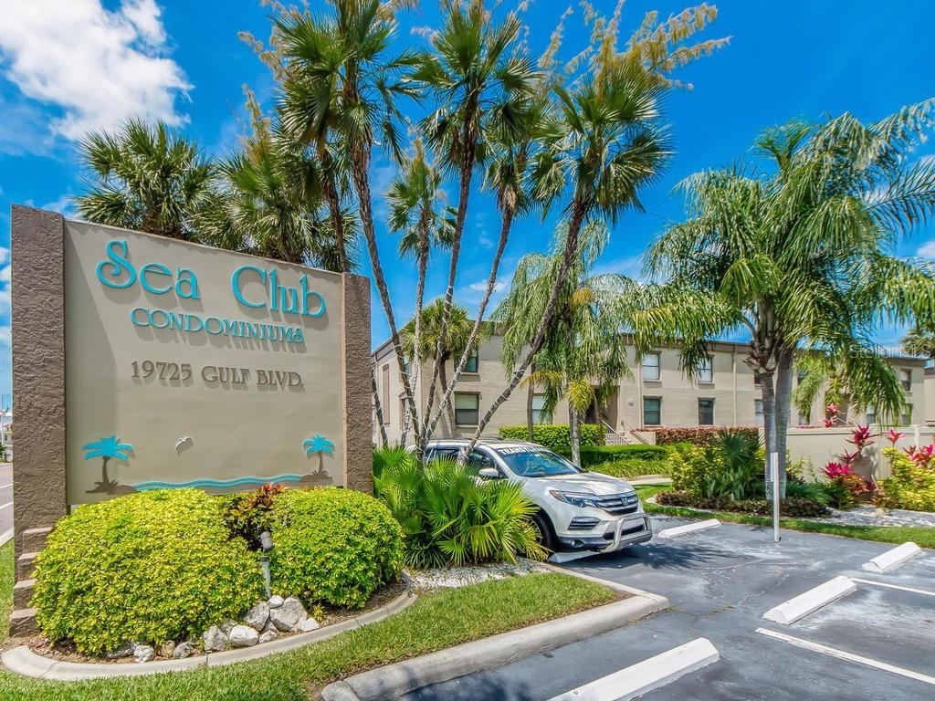 19725 Gulf Boulevard, Unit 20 Indian Rocks Beach, FL 33785 - Photo 1 of 1 a front view of a house with garden