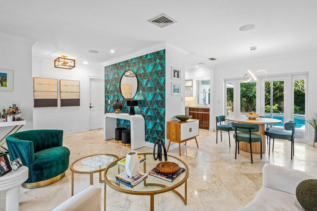 1181 Walnut Terrace Boca Raton, FL 33486 - Photo 3 of 26 a living room with fireplace furniture and a large window