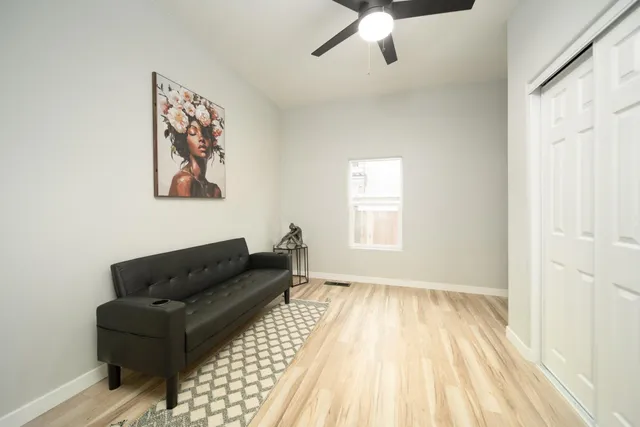 a living room with furniture and a window