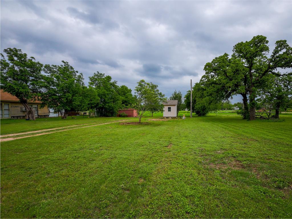 609 West 12th Street Cisco, TX 76437 - Photo 2 of 11 a view of a green field
