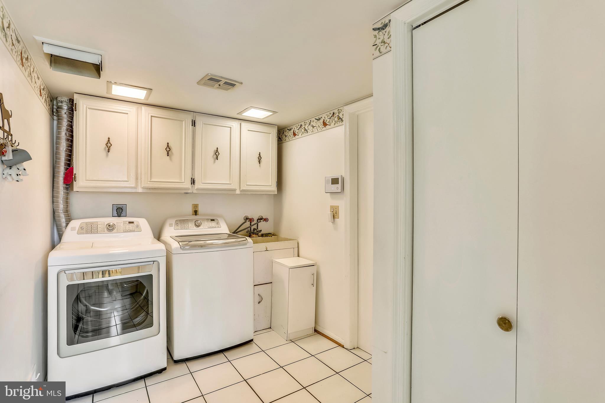15312 Durant Street Silver Spring, MD 20905 - Photo 17 of 43 Large Laundry Room on Main Level