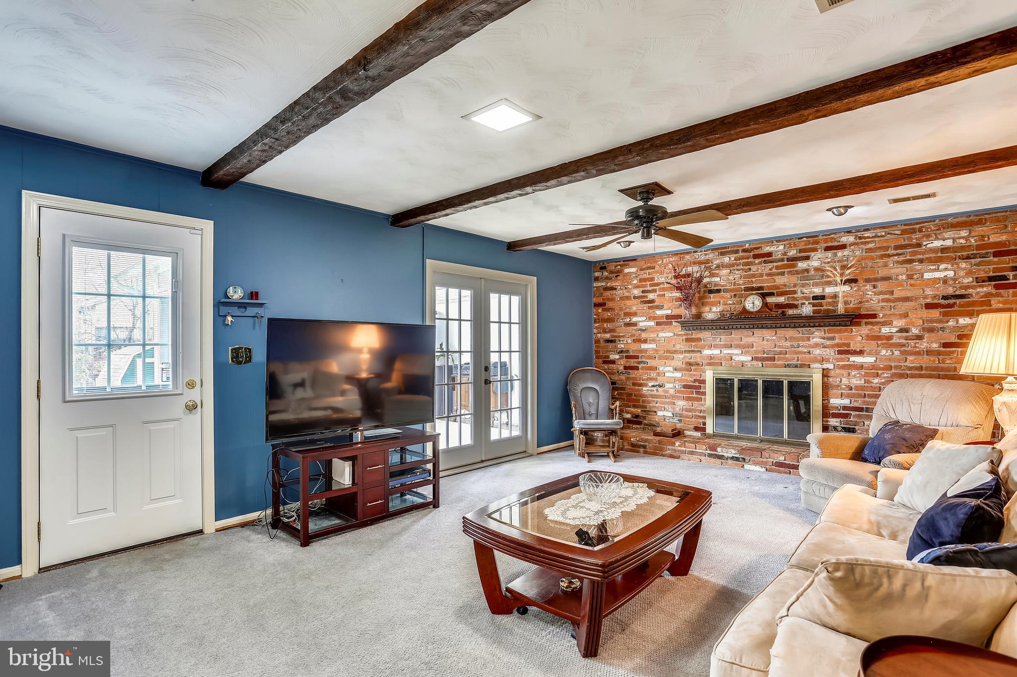 15312 Durant Street Silver Spring, MD 20905 - Photo 18 of 43 Family Room with Brick Wood Burning Fireplace
