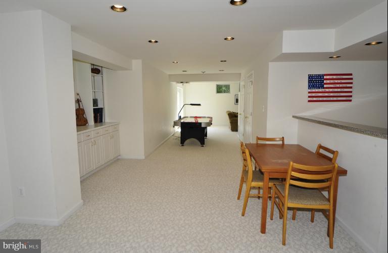 1338 Dasher Lane Reston, VA 20190 - Photo 21 of 24 a view of a dining room with furniture