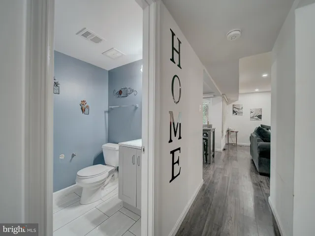 a bathroom with a sink and a toilet