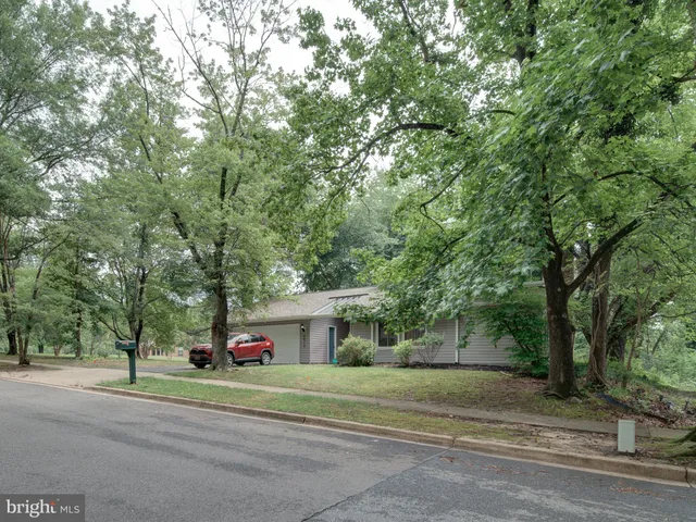a view of a trees in front of a building