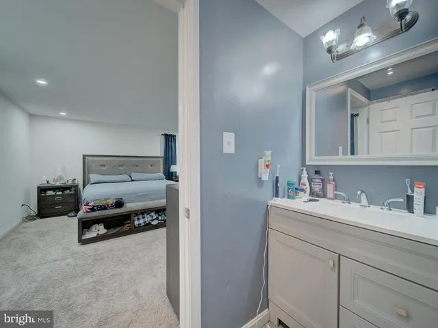 a bathroom with a toilet sink