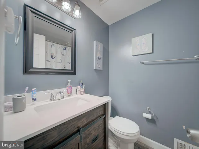 a view of backyard with a garden and plants