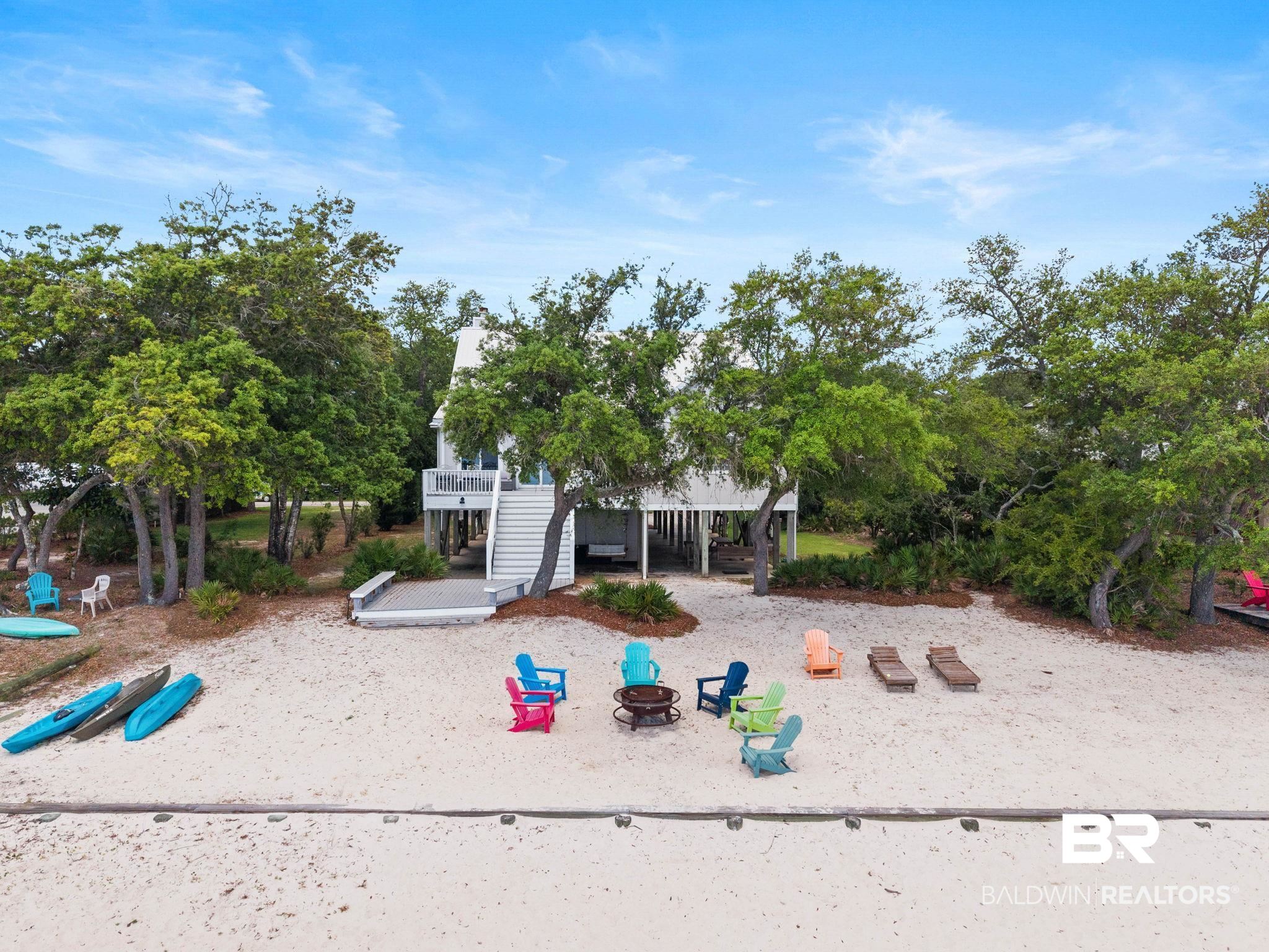 6802 Shore Drive Elberta, AL 36530 - Photo 26 of 34 Coastal property featuring a sand shoreline and elevated residence