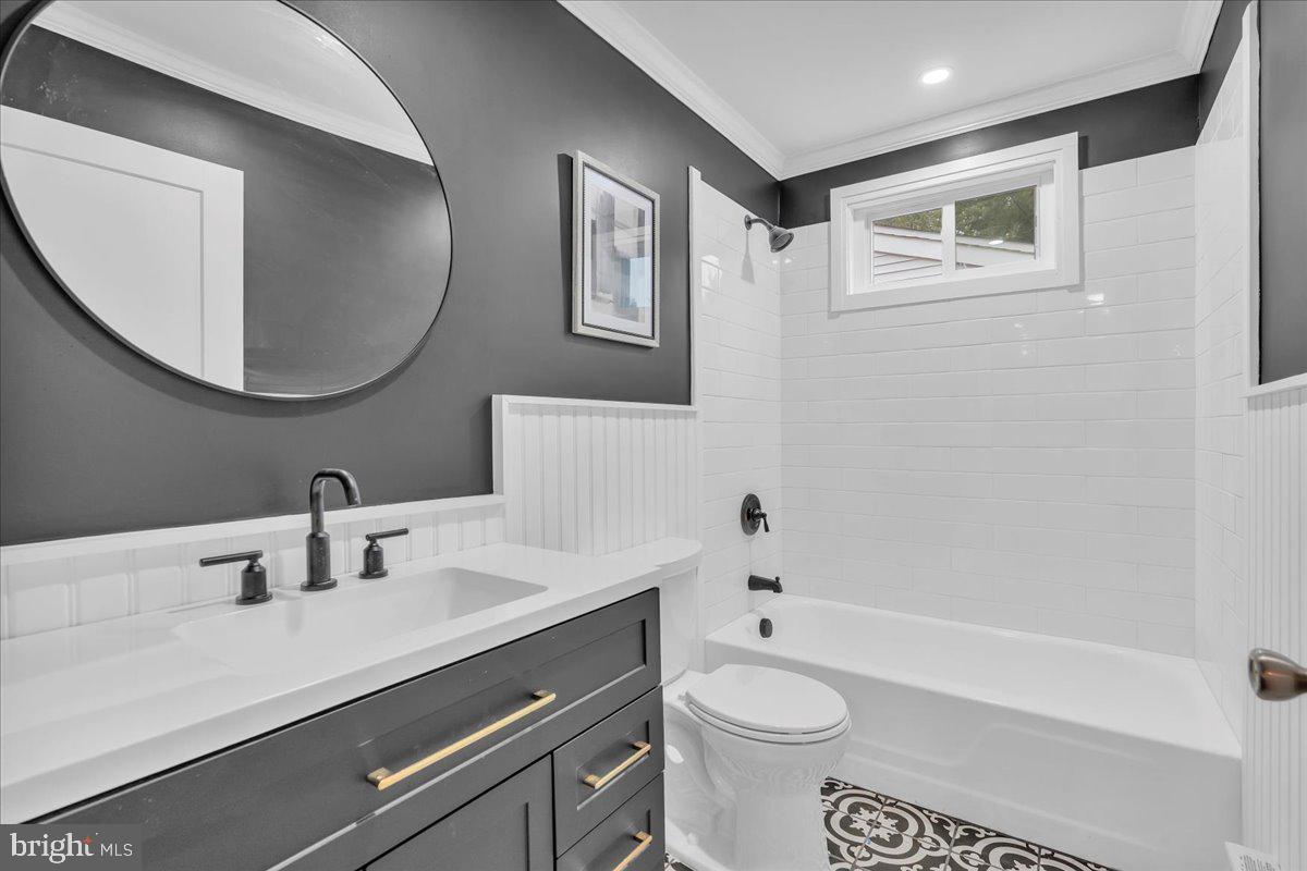 39 Chelsea Place Southampton, NJ 08088 - Photo 15 of 23 a bathroom with a sink a toilet and a mirror