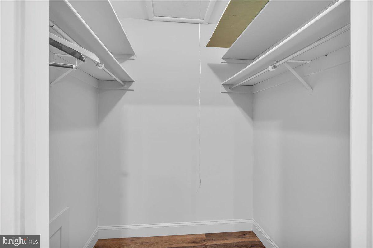 39 Chelsea Place Southampton, NJ 08088 - Photo 16 of 23 a view of walk in closet with empty racks