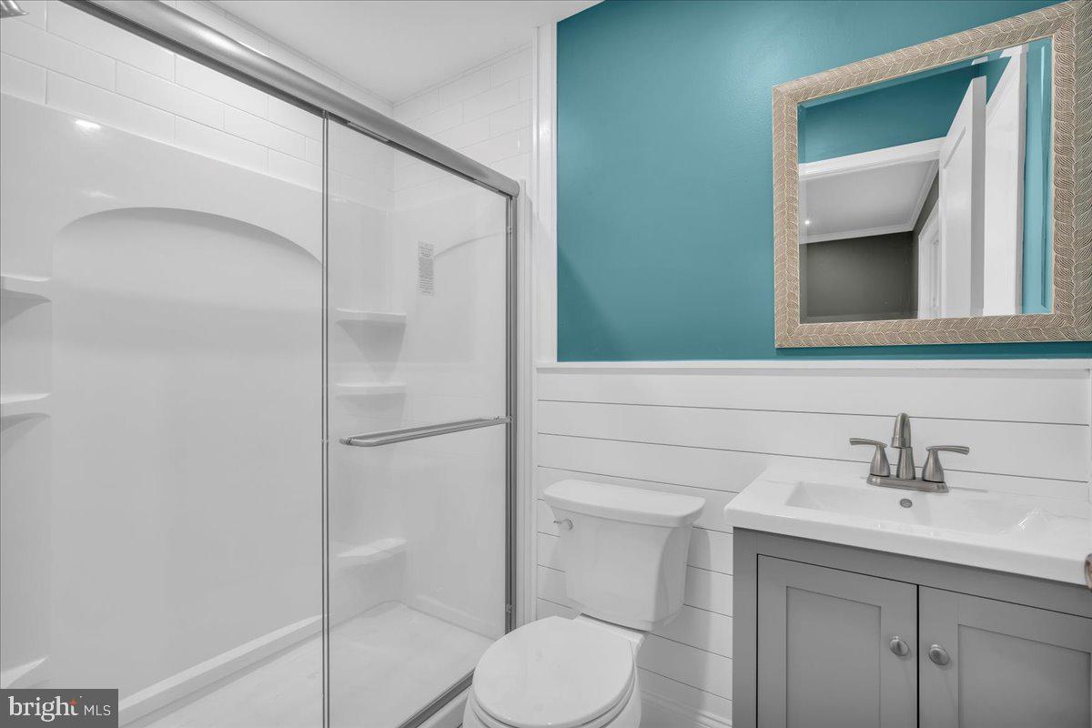 39 Chelsea Place Southampton, NJ 08088 - Photo 19 of 23 a bathroom with a toilet sink and shower