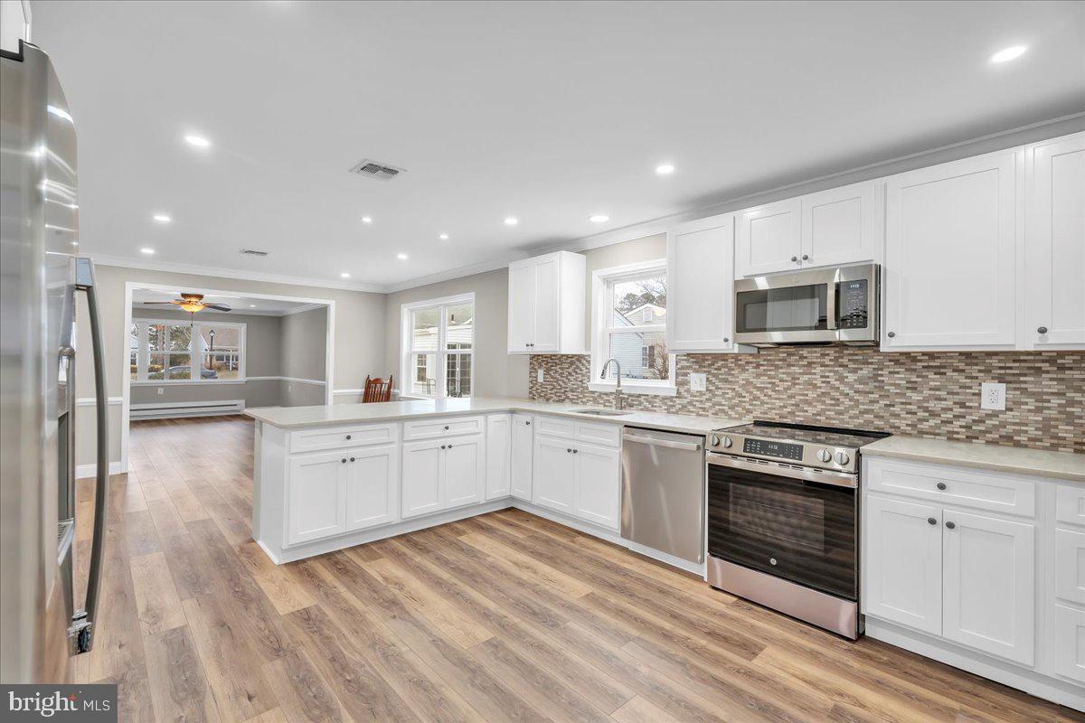 39 Chelsea Place Southampton, NJ 08088 - Photo 7 of 23 a large kitchen with cabinets