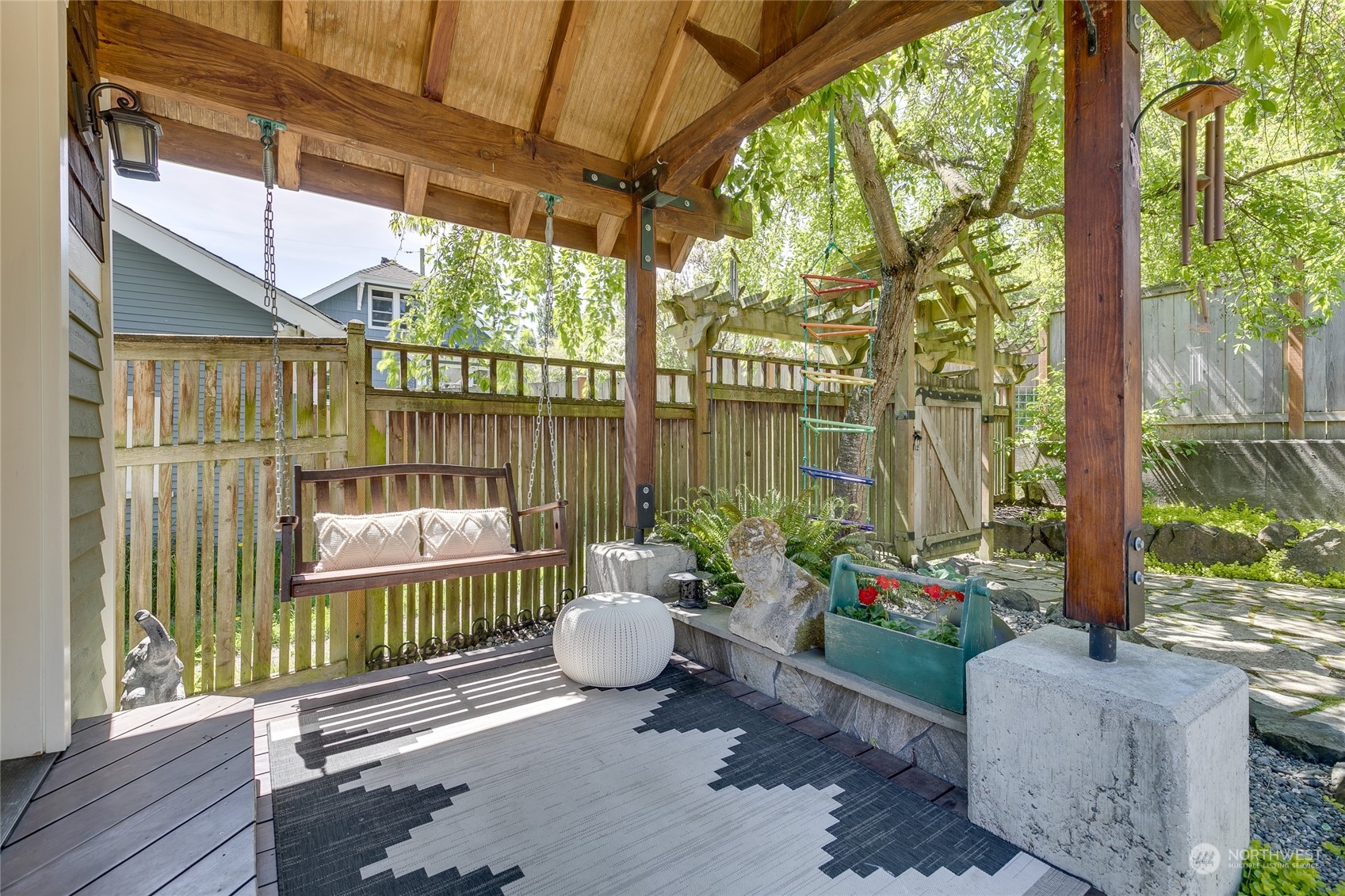 651 Northwest 89th Street Seattle, WA 98117 - Photo 14 of 38 a garden view with a seating space