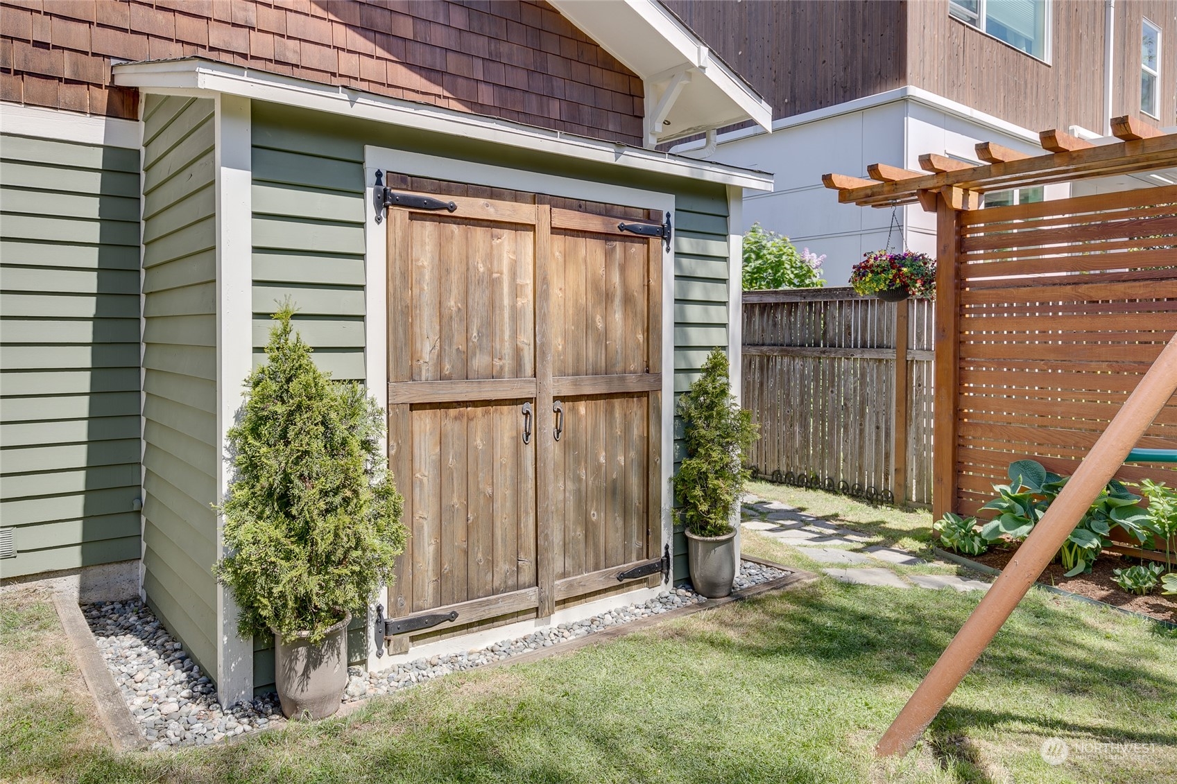 651 Northwest 89th Street Seattle, WA 98117 - Photo 15 of 38 a backyard of a house