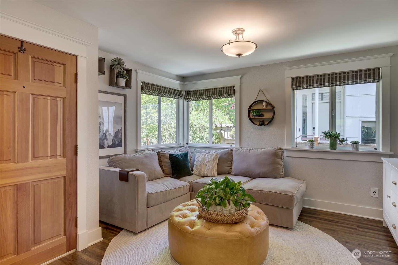 651 Northwest 89th Street Seattle, WA 98117 - Photo 17 of 38 a living room with furniture and a large window