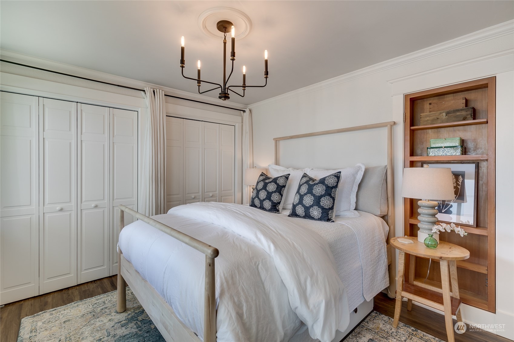 651 Northwest 89th Street Seattle, WA 98117 - Photo 29 of 38 a bedroom with a bed and a table