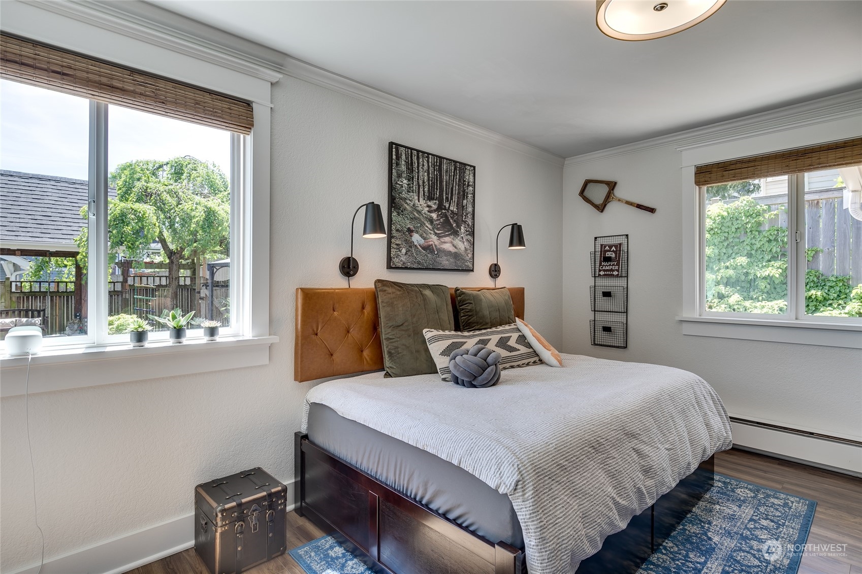 651 Northwest 89th Street Seattle, WA 98117 - Photo 32 of 38 a bedroom with a bed and a large window