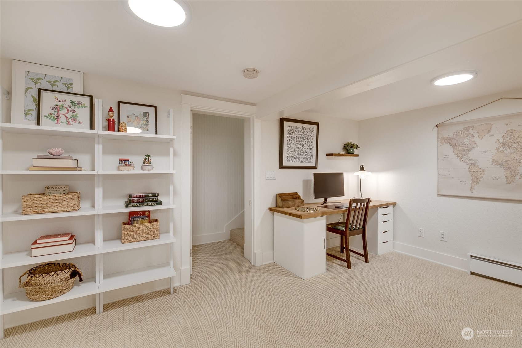 651 Northwest 89th Street Seattle, WA 98117 - Photo 36 of 38 a work room with furniture and a table