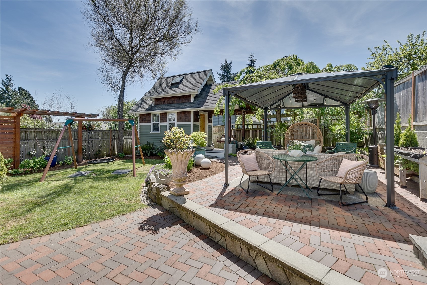 651 Northwest 89th Street Seattle, WA 98117 - Photo 6 of 38 a view of a table and chairs in patio of the house