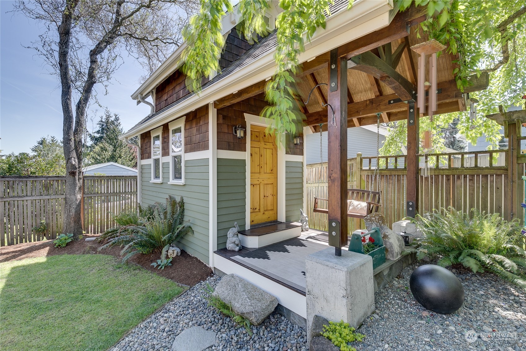 651 Northwest 89th Street Seattle, WA 98117 - Photo 9 of 38 a view of a house with backyard and sitting area