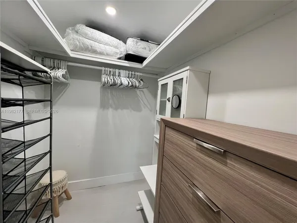 a view of an empty walk in closet