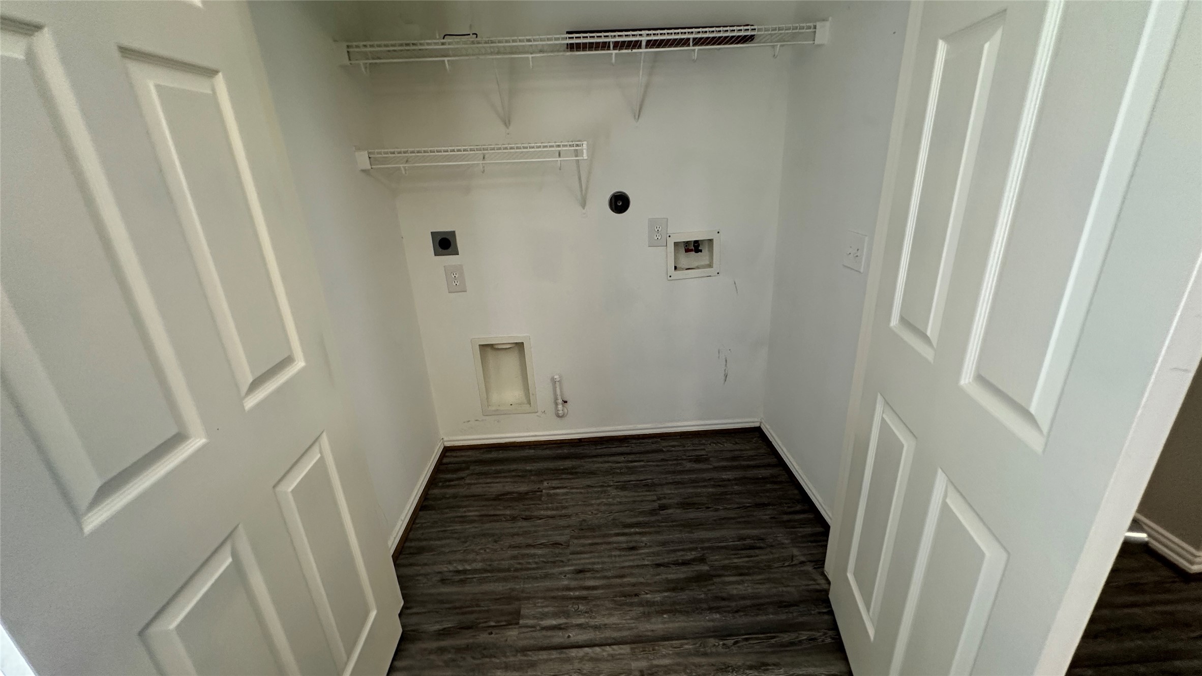 23851 Single Oak Street Spring, TX 77373 - Photo 6 of 15 a view of a hallway with wooden floor and staircase