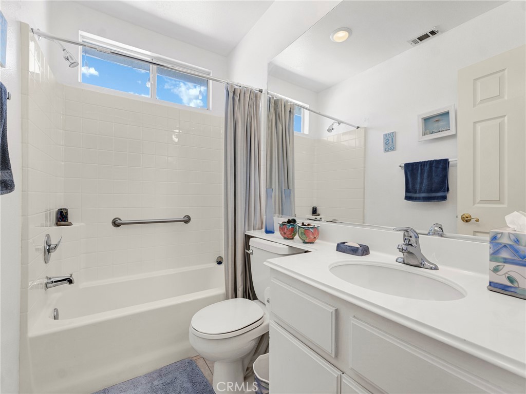 5621 Daisy Street Simi Valley, CA 93063 - Photo 16 of 31 a bathroom with a sink a toilet and shower